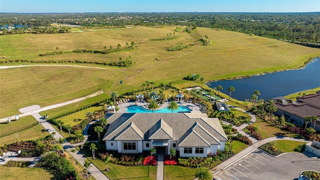 bird's eye view with a water view and a rural view