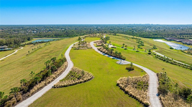 drone / aerial view with a rural view and a water view