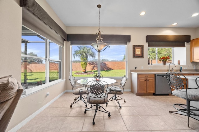 dining space with light tile patterned floors