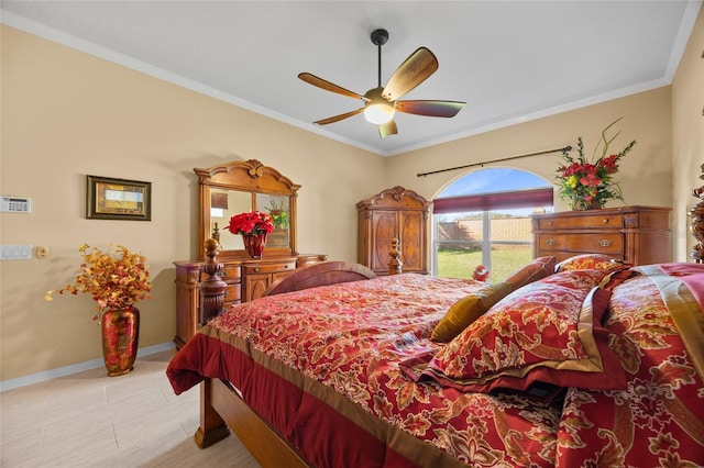 bedroom with ceiling fan and crown molding