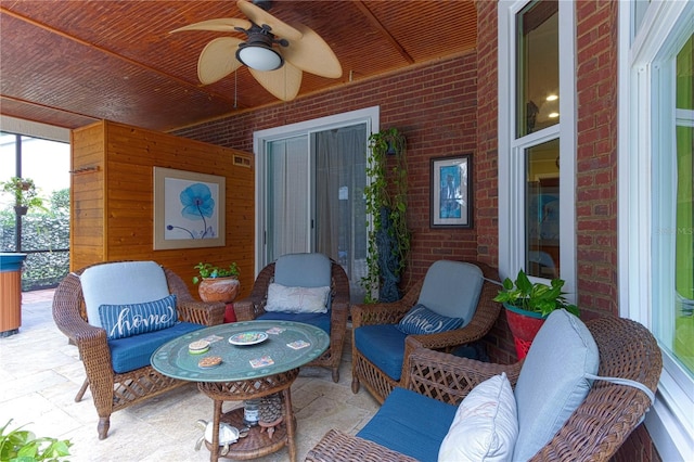 view of patio with ceiling fan