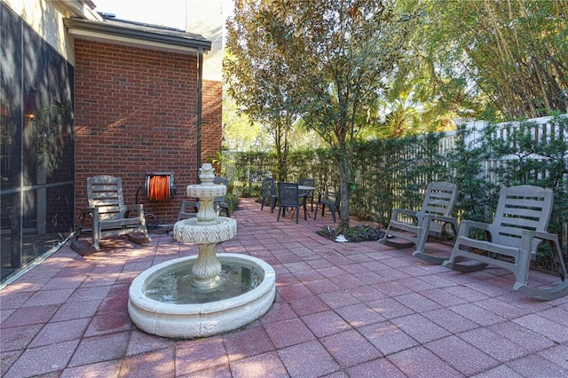 view of patio / terrace with fence