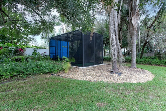 view of outdoor structure featuring fence