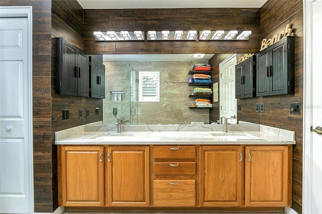 full bathroom with double vanity and a sink