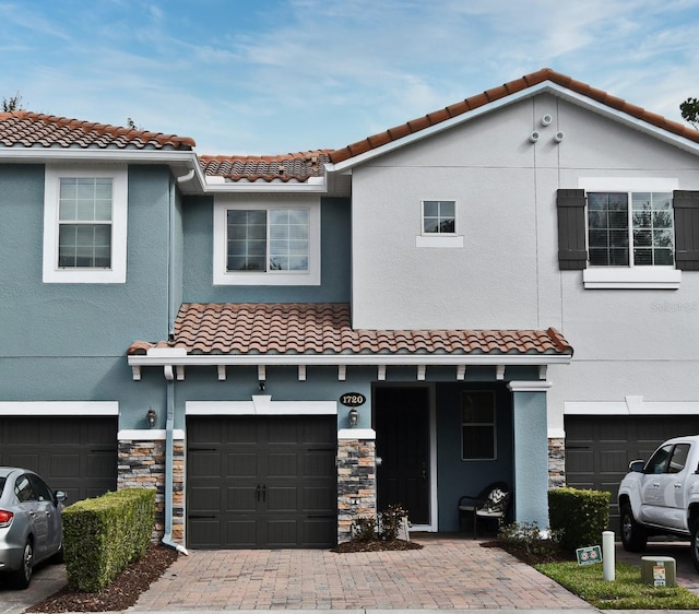 view of front of home with a garage