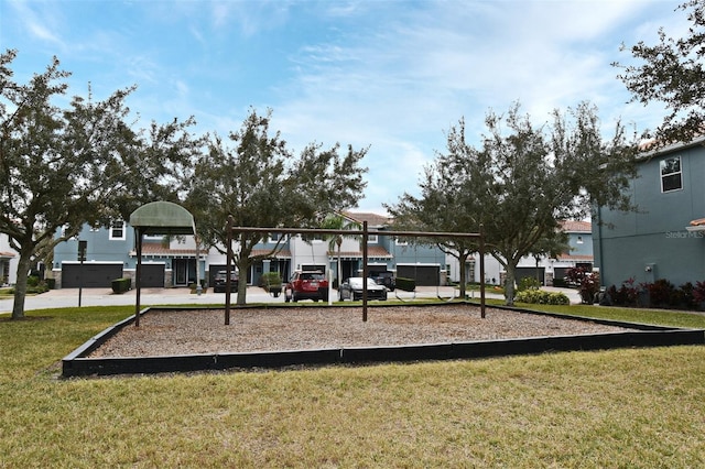 view of play area with a yard