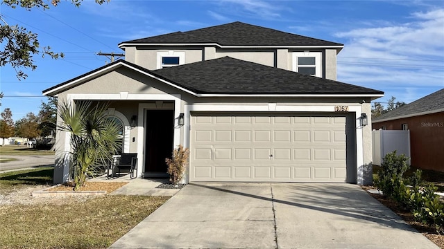 view of front of property featuring a garage