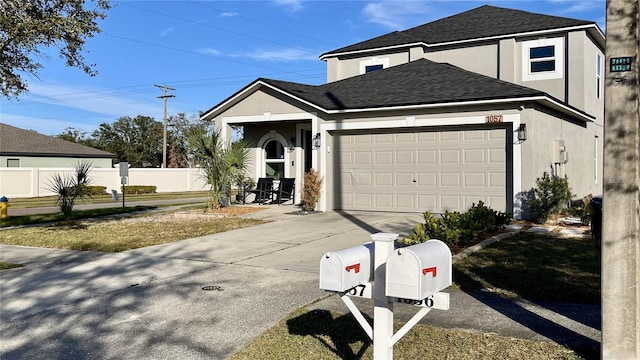 view of front of property with a garage