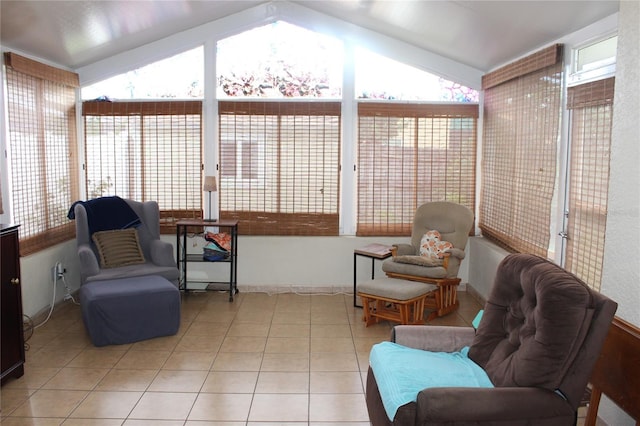 sunroom / solarium featuring vaulted ceiling