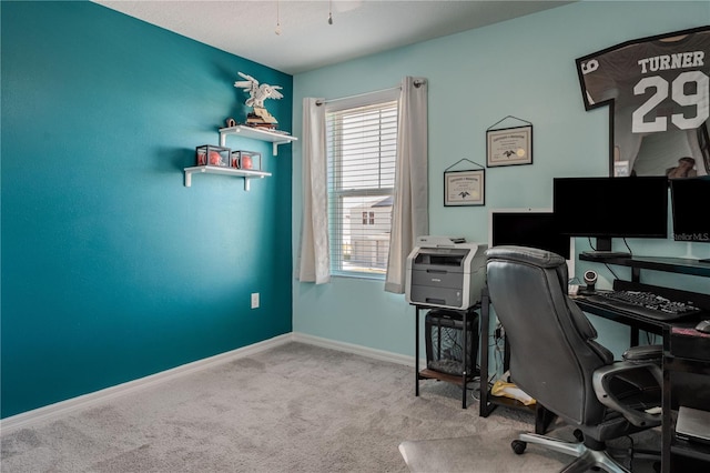 office area featuring light colored carpet