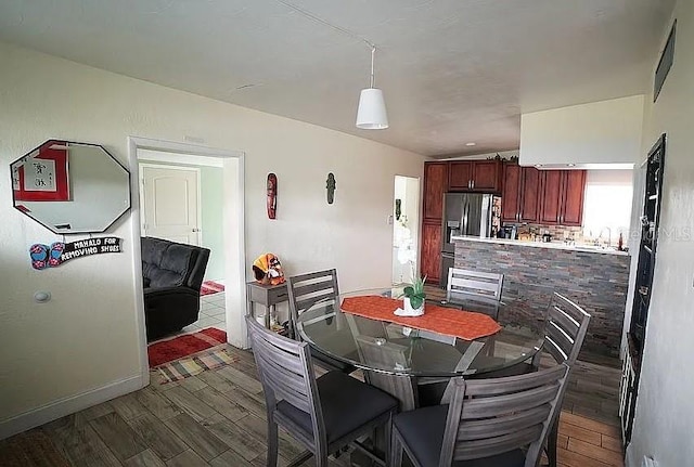 dining room featuring hardwood / wood-style flooring