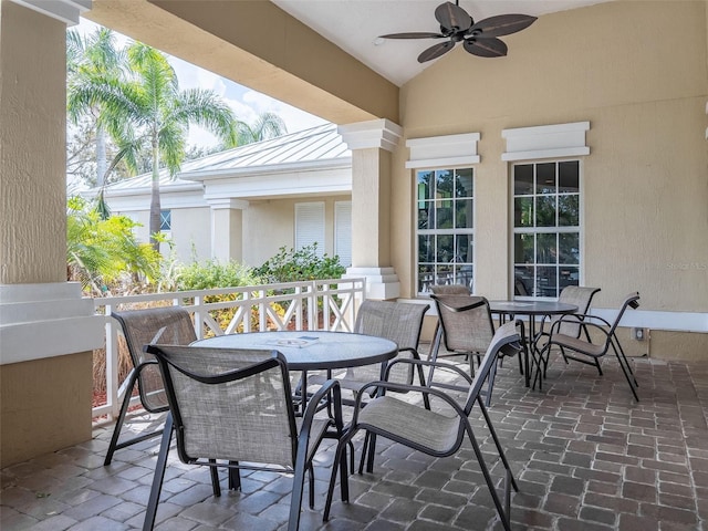 view of patio featuring ceiling fan