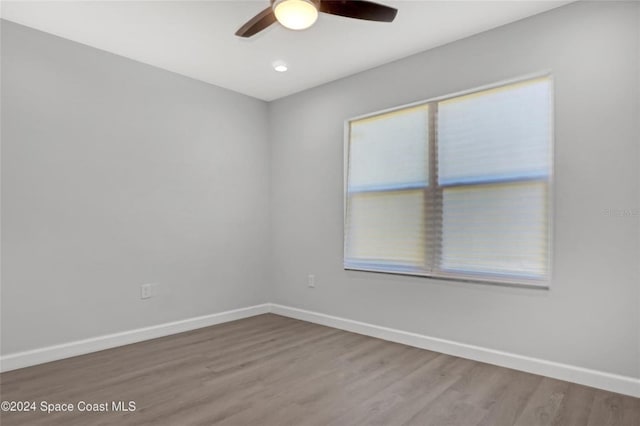 unfurnished room featuring wood-type flooring and ceiling fan