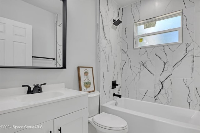 full bathroom with toilet, vanity, and tiled shower / bath combo