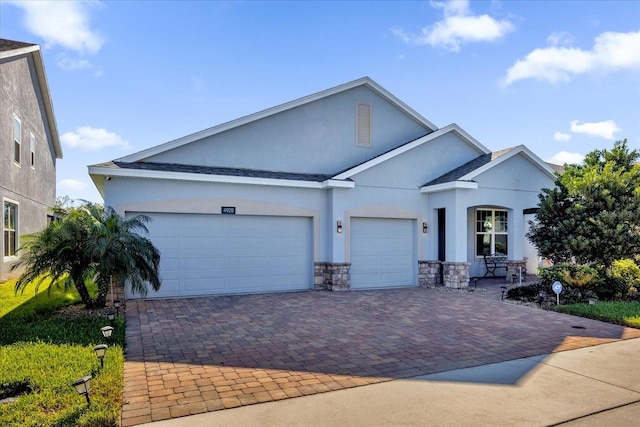 single story home with a garage