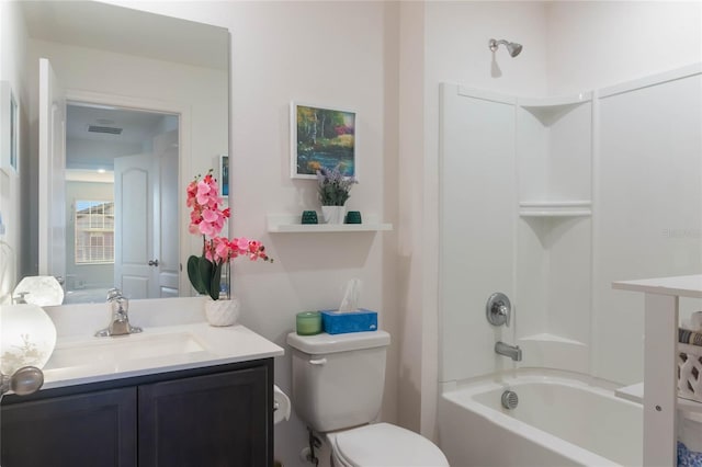 full bathroom with bathing tub / shower combination, vanity, and toilet