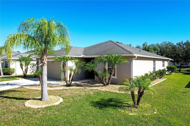 ranch-style home with a front lawn and a garage