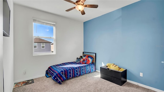 bedroom featuring ceiling fan and carpet flooring