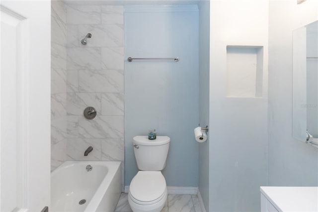 full bathroom with vanity, tiled shower / bath combo, and toilet