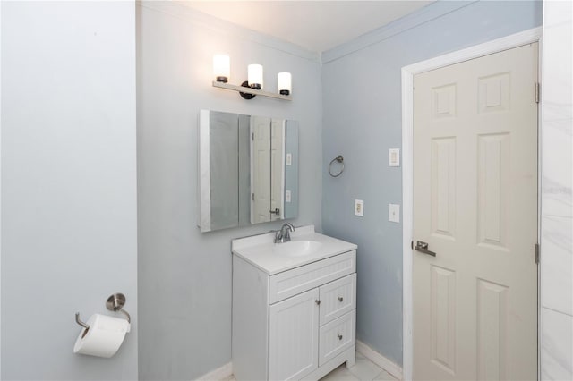 bathroom featuring vanity and crown molding