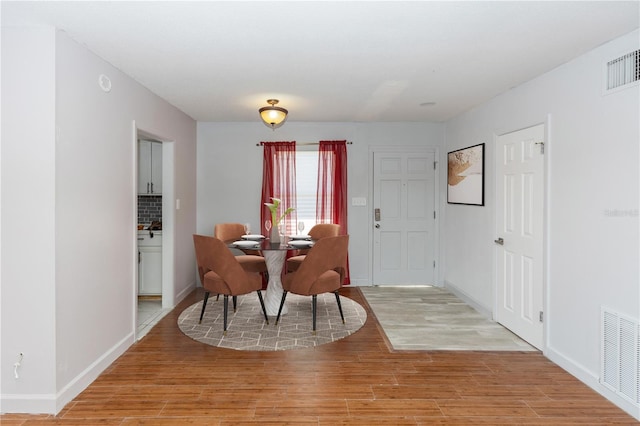 dining area featuring light hardwood / wood-style floors