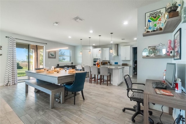 dining room featuring light wood-type flooring