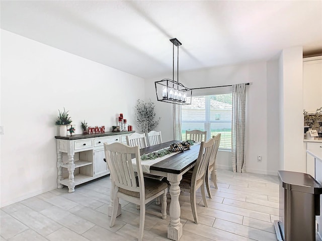 dining area featuring light wood-type flooring