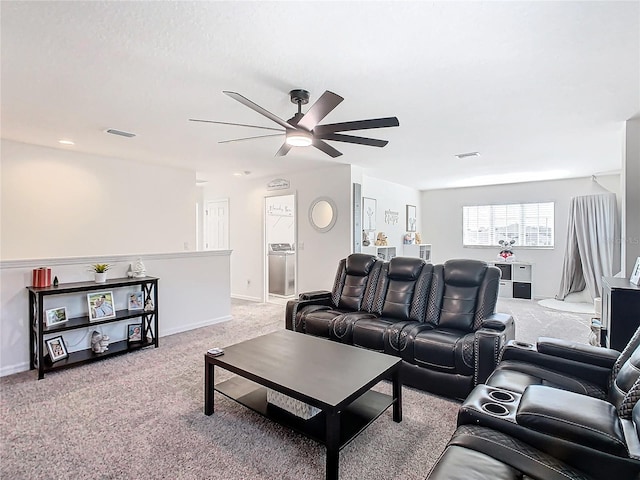 carpeted living room featuring ceiling fan