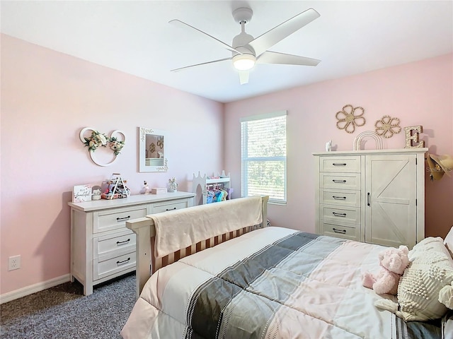 bedroom with dark carpet and ceiling fan