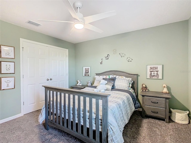 bedroom featuring a closet, dark carpet, and ceiling fan