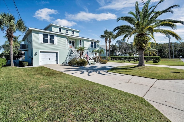 view of front facade with cooling unit, a front yard, and a garage