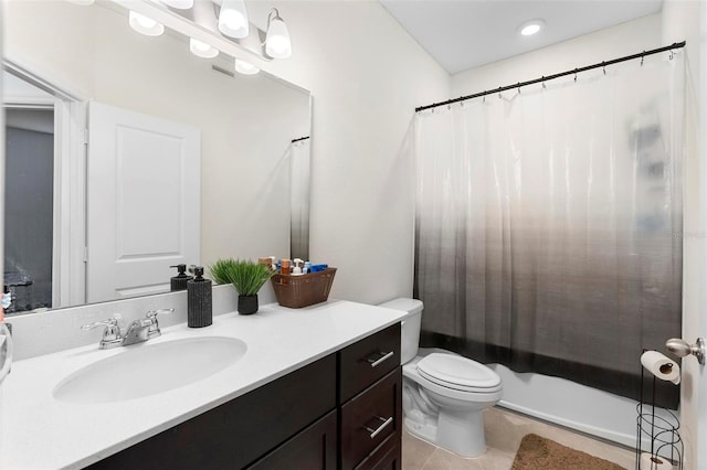 full bathroom featuring tile patterned flooring, vanity, toilet, and shower / bathtub combination with curtain