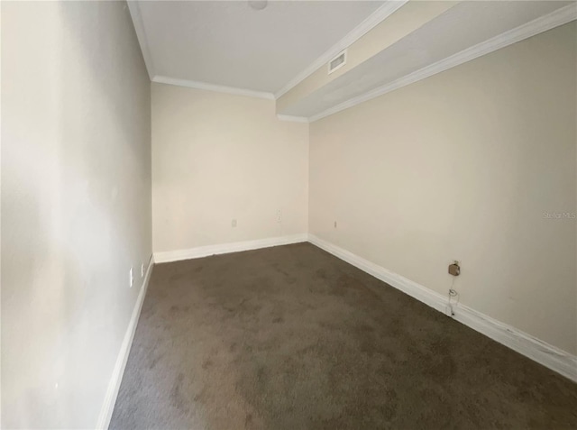 unfurnished room featuring crown molding and dark carpet