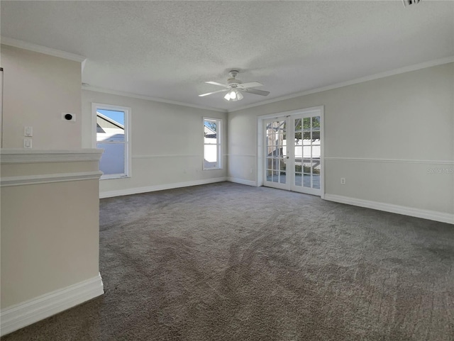 carpeted spare room featuring ceiling fan, crown molding, a textured ceiling, and french doors