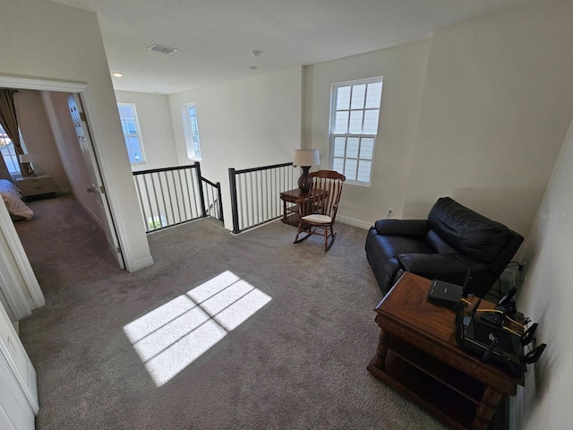 living area with carpet flooring