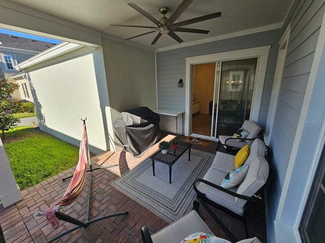 view of patio featuring ceiling fan and an outdoor hangout area