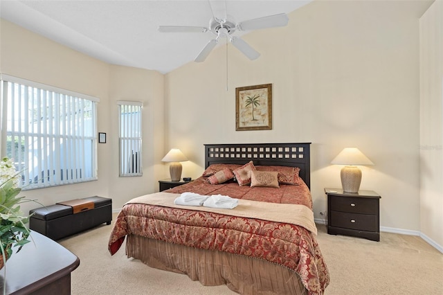 bedroom featuring ceiling fan and light carpet