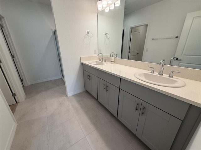 bathroom with vanity and tile patterned floors