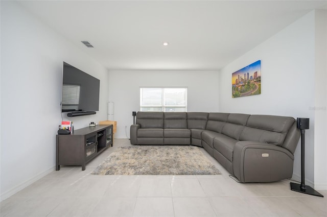 living room featuring light tile patterned flooring