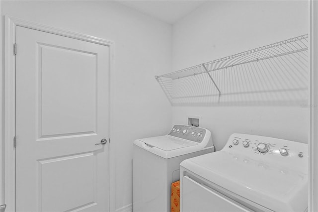 laundry area featuring independent washer and dryer