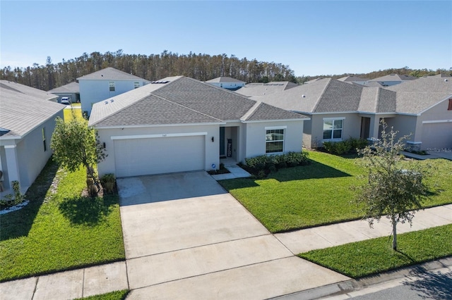 single story home featuring a garage and a front lawn