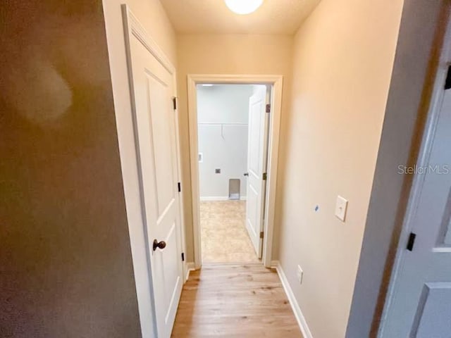 hallway featuring light hardwood / wood-style flooring