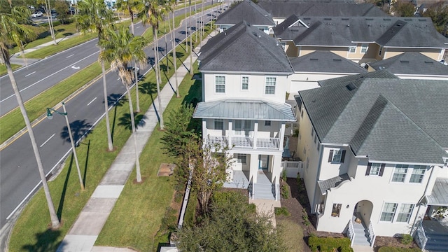 birds eye view of property with a residential view