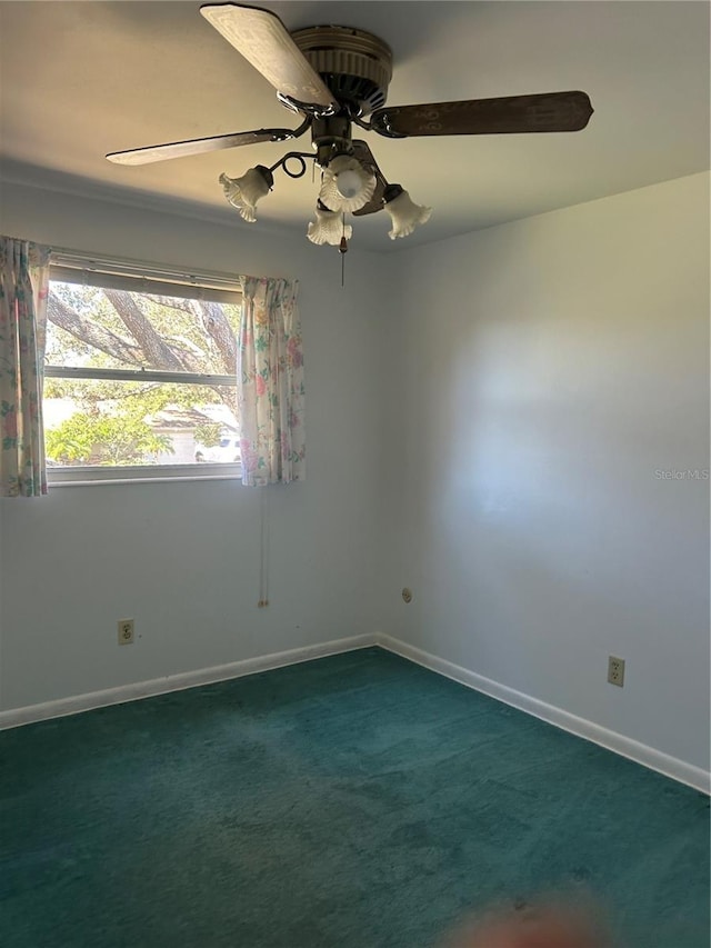 carpeted empty room with ceiling fan