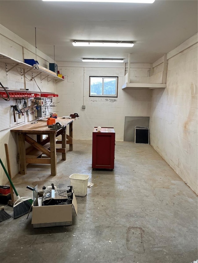 basement featuring a workshop area