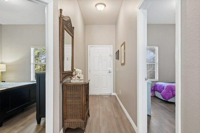 hallway featuring light hardwood / wood-style flooring