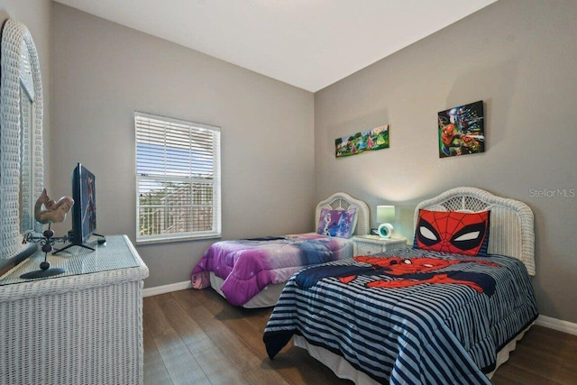 bedroom featuring dark hardwood / wood-style floors