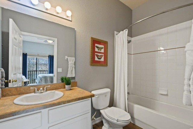 full bathroom featuring vanity, toilet, and shower / bathtub combination with curtain