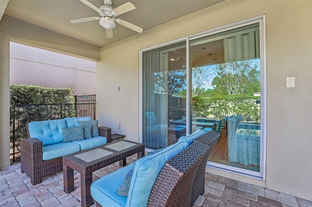 view of patio with ceiling fan and an outdoor hangout area