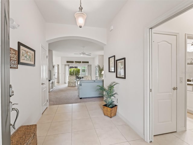 corridor with light colored carpet